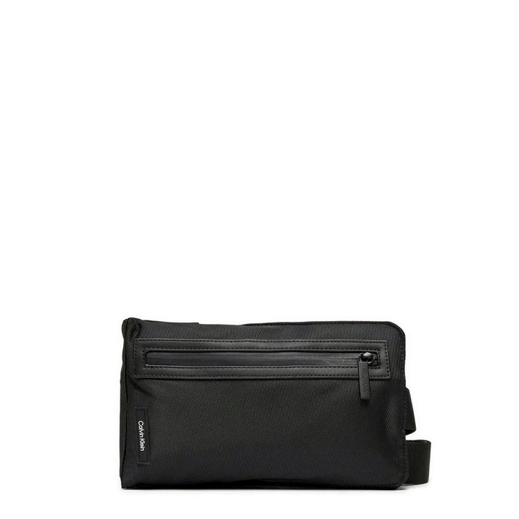 CK ESSENTIAL SLING BAG